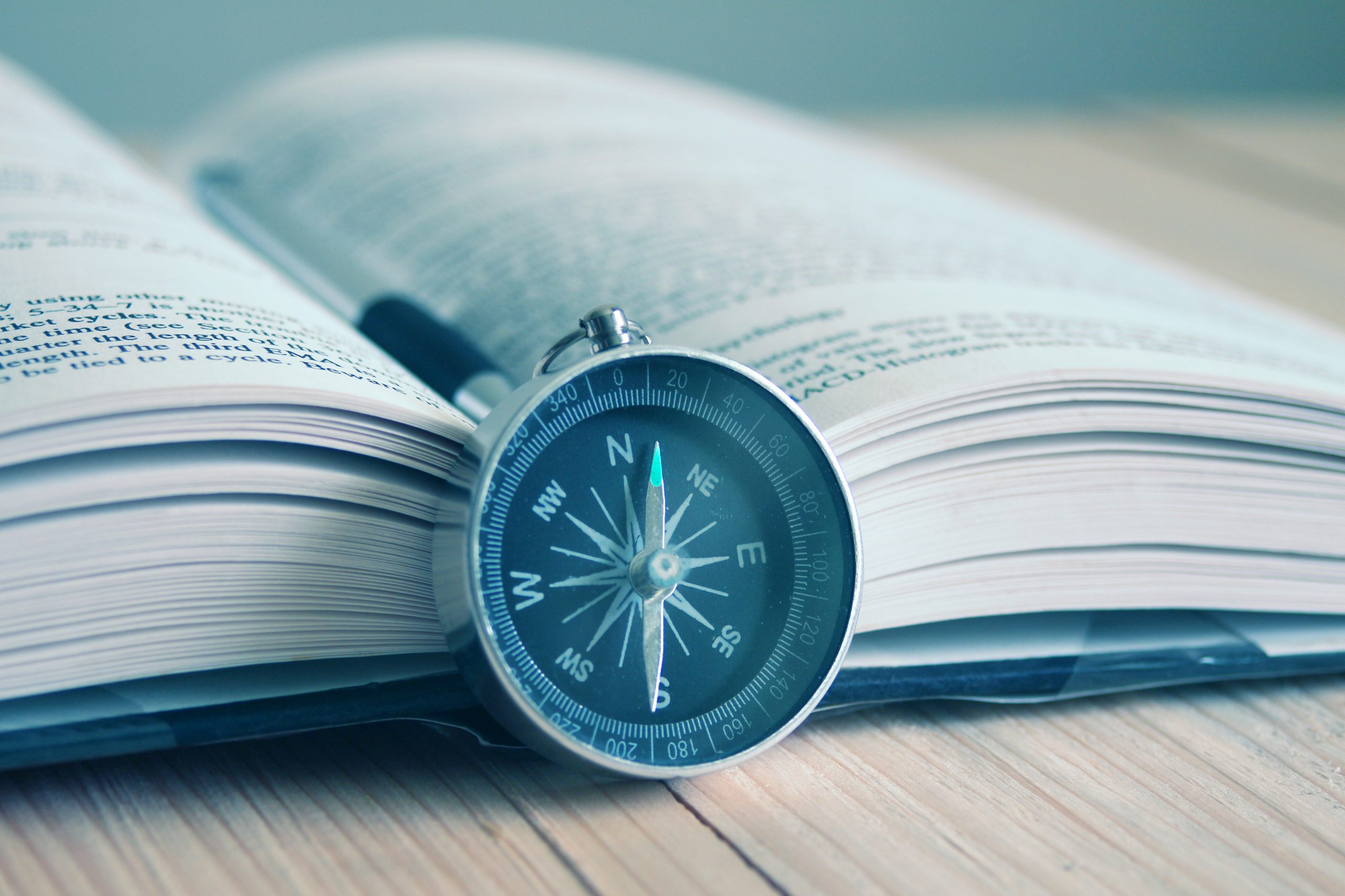 compass and book