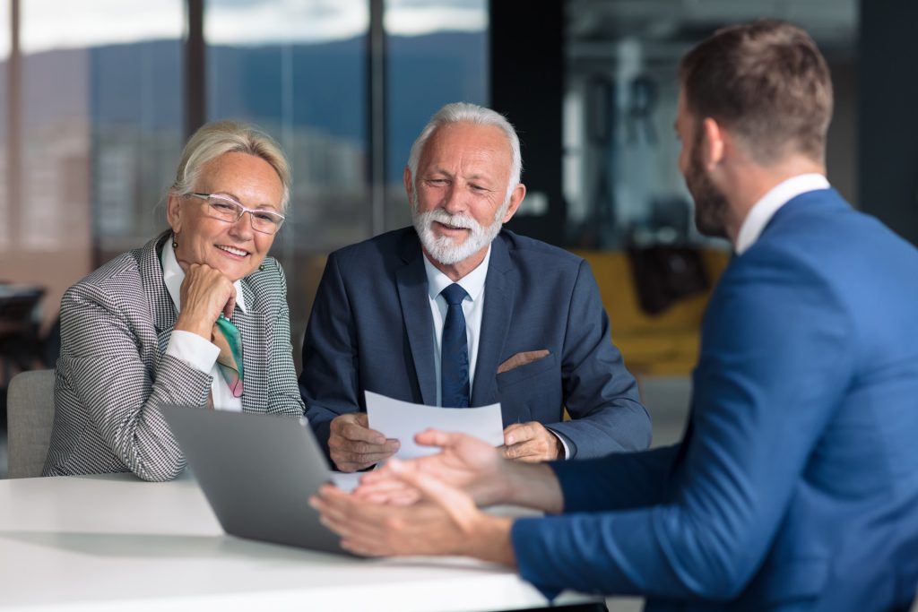 Insurance Agent Reviewing Solutions with Clients